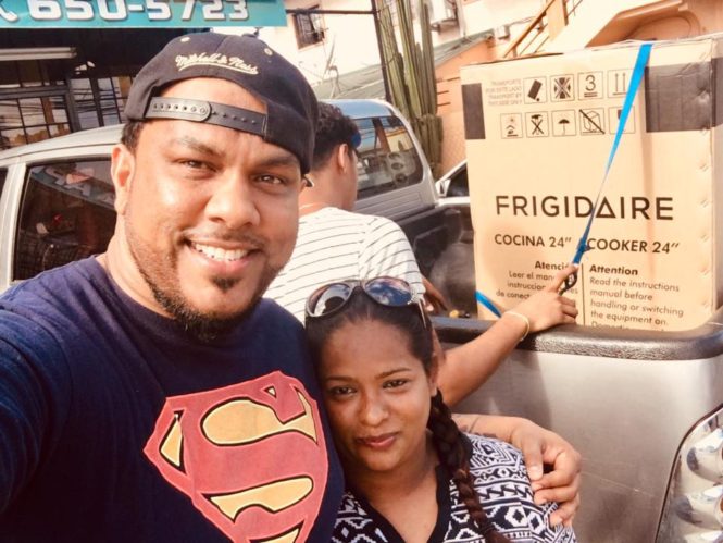 Raymond Ramnarine Provides Some Relief To A Woman Whose House Burnt Down On Diwali Day By A Firecracker