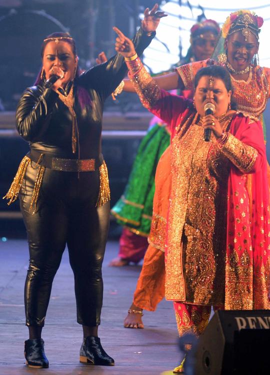 Traditional Chutney Singer, Hemlata Dindial, And Her Sister  rasika Dindia During Their Performance At The Finals Of The Soca Chutney Monarch